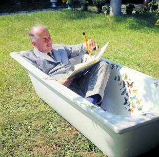 Piero Fornasetti in his bathtube, courtesy Fornasetti