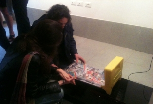 Alvise Bittente playing with his installation