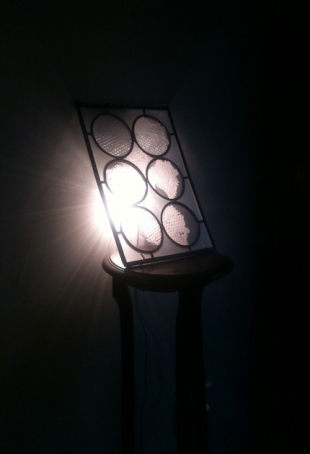 Daniela Manzolli's studio on handmade polished and carved glass applied to Venetian window style